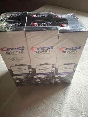 6 count of whitening Toothpaste (Crest 3D White) charcoal deep clean 2.4oz each